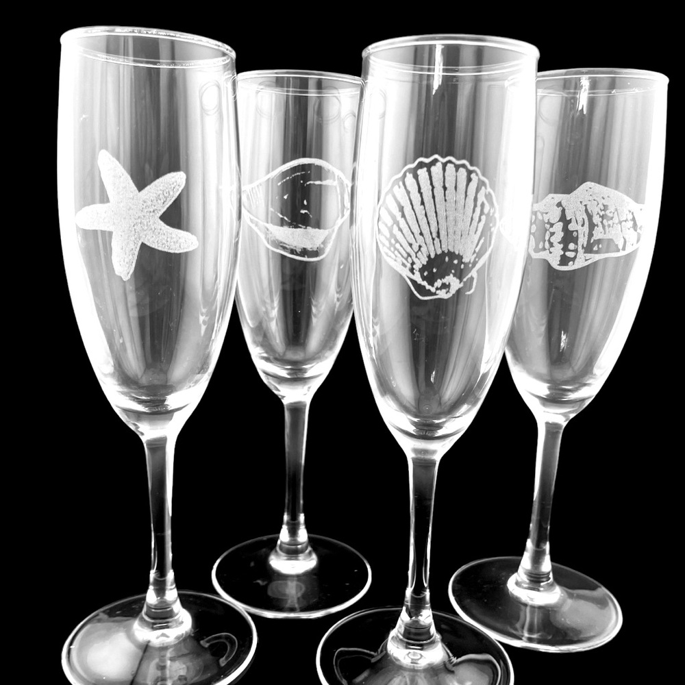 Set of 4 laser engraved shell stemmed flutes